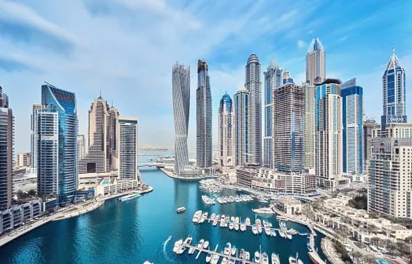 Aerial view of Dubai Marina showing modern skyscrapers and yacht harbor